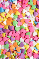 Fototapeta na wymiar Scattered candy hearts