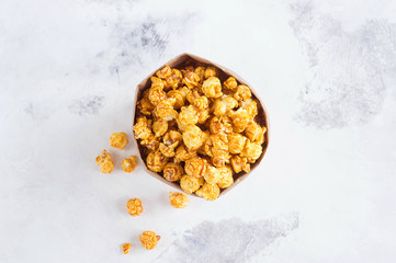 Caramel popcorn in a paper bag