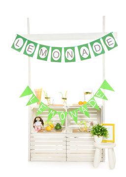 Lemonade stand with decor on white background