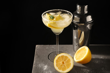 Delicious cocktail with tequila on table