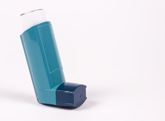 Asthma inhaler isolated on white.
