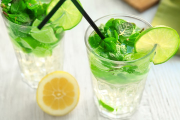 Delicious cocktail with tequila on table