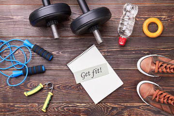 Equipment for exercises in sport gym. Get fit with dumbbells. Concept of healthy lifestyle.