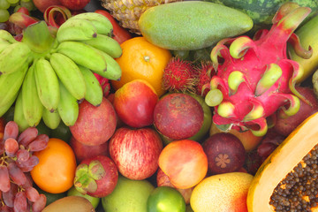 Fresh tropical fruits background