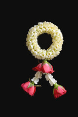 Thai traditional jasmine garland. symbol of Mother's day in thailand on black background