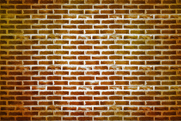 Gold brick wall texture or background. A wall of shiny gold blocks