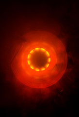Concept of speed - Trail of fire and smoke - Vinyl record. Burning vinyl disk. Turntable vinyl record player. Retro audio equipment for disc jockey. Sound technology. Close up