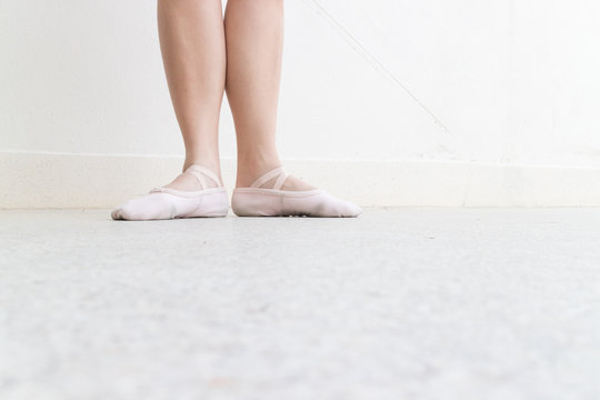 ballet first foots position on left frame on the street with point shoes