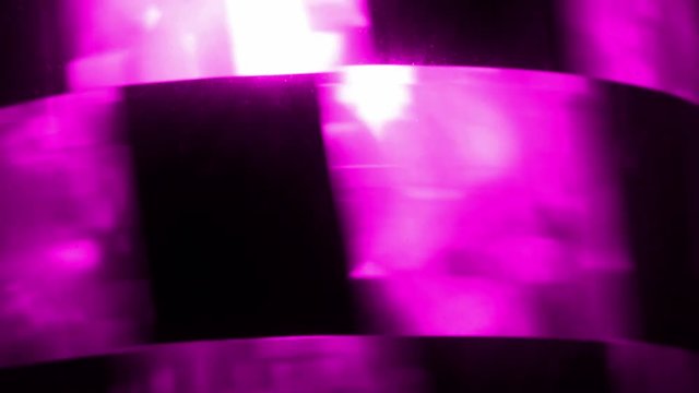 Rotating neon light.