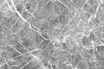Rough surface of natural stone with white streaks background 