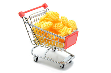 shopping cart with chips on a white background