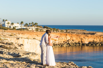 Young Couple On Beach Summer Vacation, Happy Smiling Man And Woman Walking Seaside Sea Ocean Holiday Travel