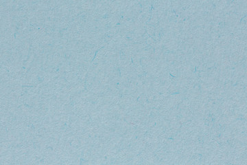 Light blue paper texture, close up.