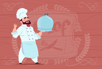 Chef Cook Holding Tray With Dish Smiling Cartoon In White Restaurant Uniform Over Wooden Textured Background Flat Vector Illustration