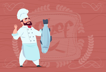 Chef Cook Hold Fish Smiling Cartoon Restaurant Chief In White Uniform Over Wooden Textured Background Flat Vector Illustration