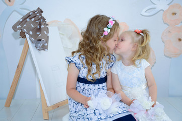 Sister having fun in the bad and sharing moments of love.