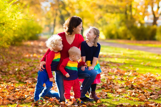 Mother and kids in autumn park