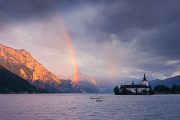 Rainbow over the lake and mountains, Austria,Gmunden,Alps.Beautiful evening landscape with a...
