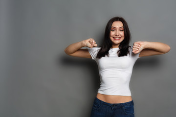 Happy girl posing to camera and shouting