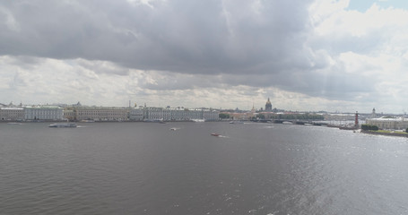 Fototapeta na wymiar Aerial low altitude photo over St. Petersburg neva with view of Stock Market Square and Saint Isaac's Cathedral in summer day