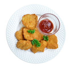 Fired chicken nuggets with sauce in ceramic plate top view isolated on white background, clipping path include