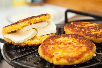 Traditional Colombian Arepa de Choclo Preparation : Grilling the stuffed corn bread