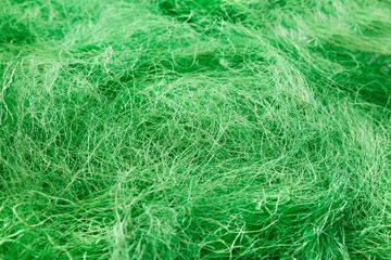 Green felted wool texture close-up