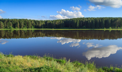 Naklejka na ściany i meble Beautiful summer landscape with expanses of Russian nature.