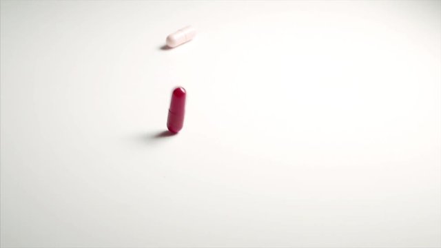 capsule tablet falling and bouncing
