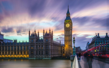 London, England - The Big Ben and the Houses of Parliament at dusk with beautiful colorful sky and...