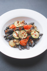 pasta with tomatoes and zucchini
