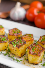 Potato fondant with garlic and herbs