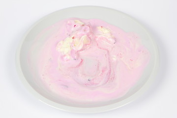 Ice cream in a white plate for a child