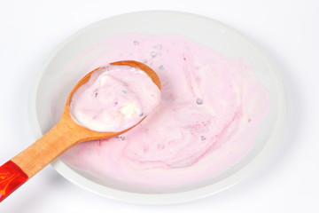 Ice cream in a white plate for a child