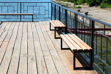 Bench on the pier, boat station, beautiful place