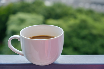 Hot coffee in cup.