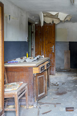 EISENBERG Germany- July 17, Abandoned office with dusty desk in Eisenberg Germany, July 15, 2017 in Eisenberg, Rhineland-Palatinate, Germany