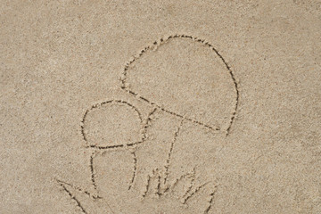 Fototapeta na wymiar mushrooms drawing in sand