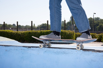 Skater jumps high in air under extrem-park