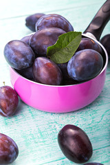 Obraz premium fresh plums on the table