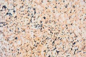 Texture of old marble slabs laid on the street