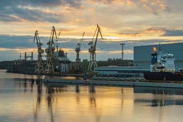 A commercial ship in dry dock repair yard in Szczecin, Poland