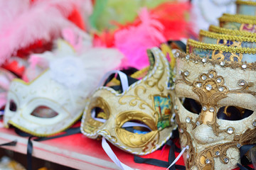 Traditional venetian mask in store on street, Verona Italy.