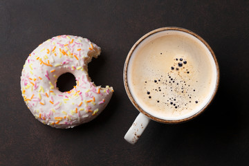Coffee cup and donut