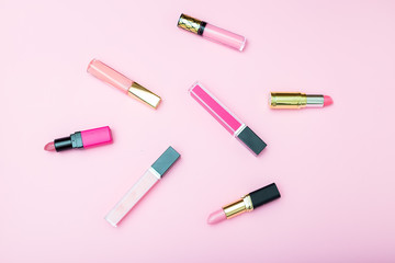 isometric view make up cosmetic products on pink background