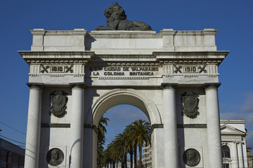 White marble arch set in landscaped gardens in Valparaiso, Chile. The arch was donated to the city by the British community to commemorate the 100th anniversary of the independence of Chile.