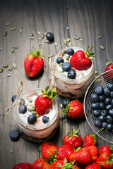 delicious dessert - yogurt with strawberries and blueberries