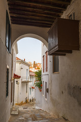Fototapeta premium Street in the old town of Skopelos, Greece. 