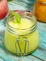 Homemade melon sorbet on a vintage background.