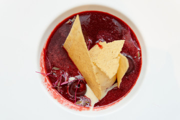 Berry dessert with vanilla ice cream